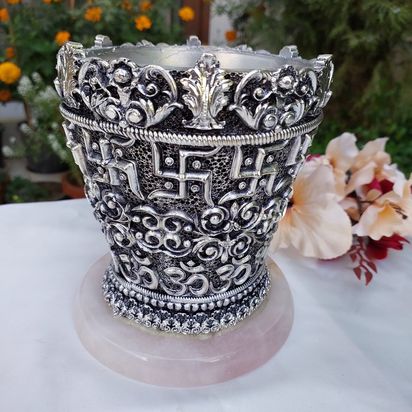Silver Swastik Vase on Rose Quartz
