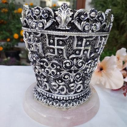 Silver Swastik Vase on Rose Quartz