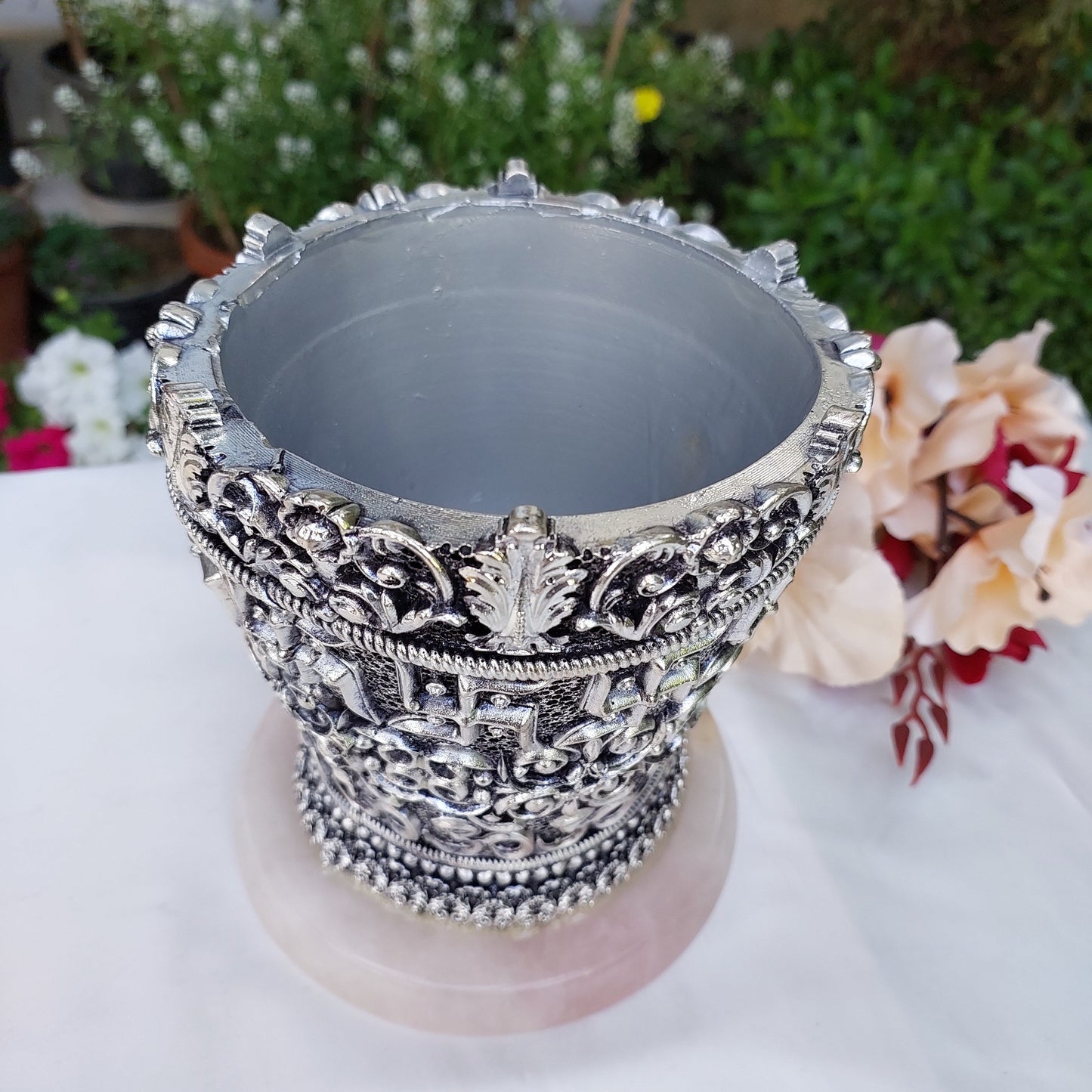 Silver Swastik Vase on Rose Quartz