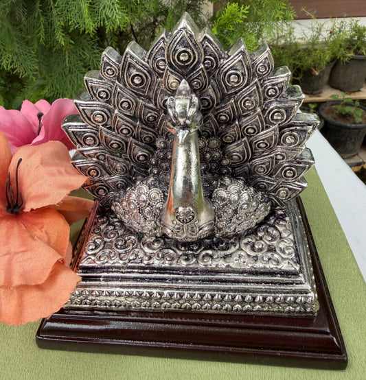 Silver Peacock Spoon Holder on resin wax